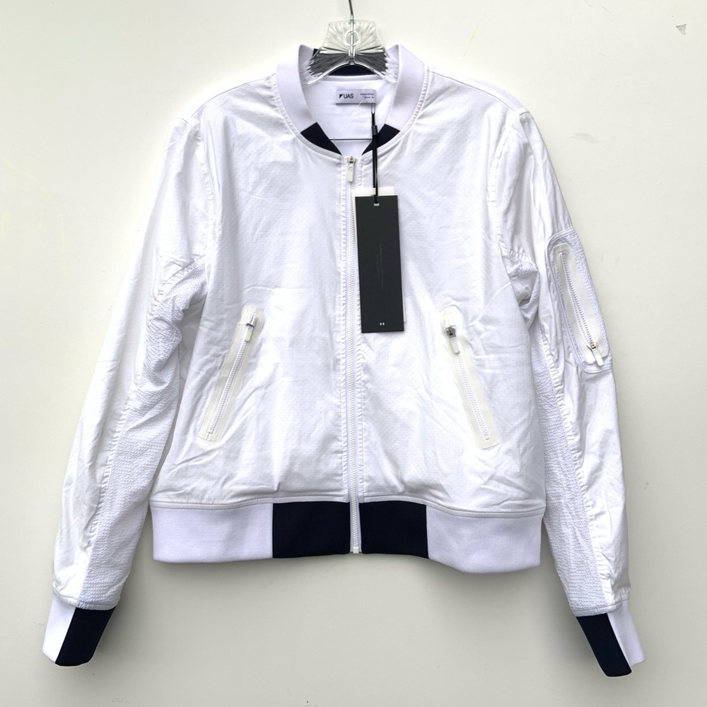 Gently used. No tags. Under Armour x Tim Coppens white bomber jacket